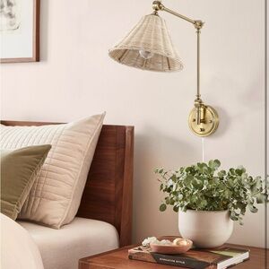 Rattan wall sconce